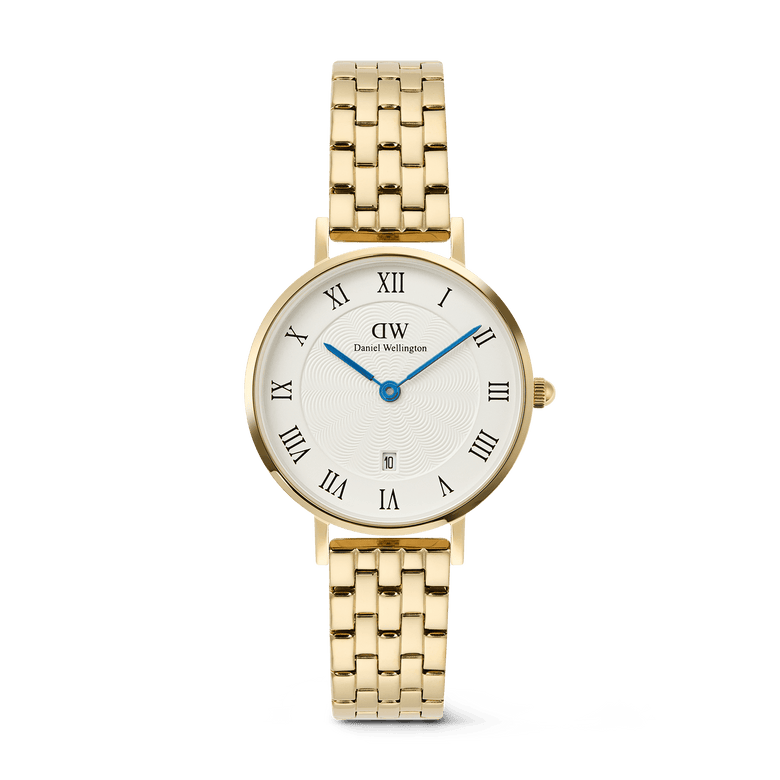 Petite Roman Numerals Date 5-link Gold ladies watch with a polished gold 5-link bracelet, white guilloché textured dial, blue hands, Roman numeral hour markers, and a date window at 6 o’clock.