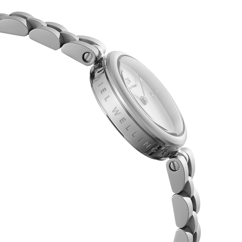Side view of the Elan Lumine Silver ladies watch, showcasing the engraved stainless steel case, three-link bracelet, and minimalist crystal dial.