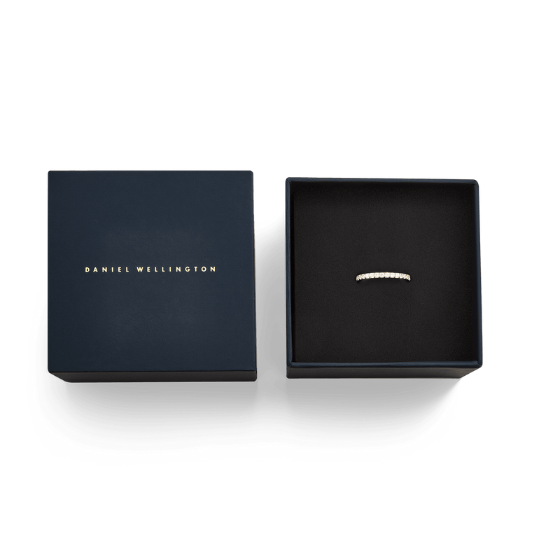 Mirelle Eternity Ring Gold 2mm presented in an open Daniel Wellington gift box, highlighting the slim gold band with white cubic zirconia crystals and elegant packaging.