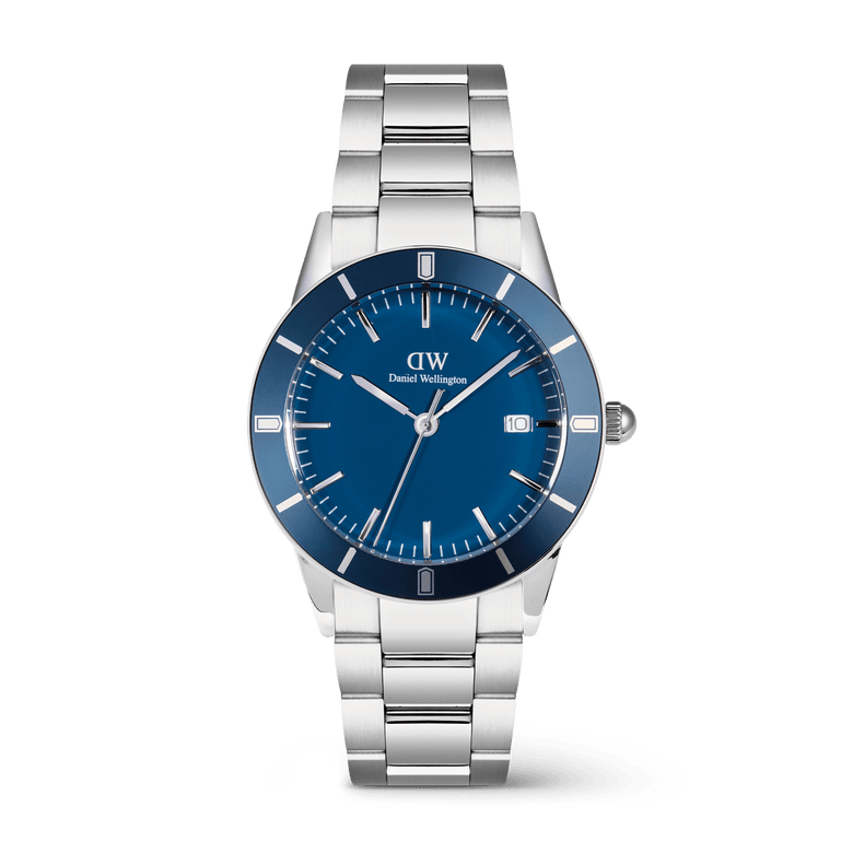 Men’s stainless steel watch with a bold blue enamel dial, silver-tone three-link bracelet, minimalist index markings, and date display, from the Iconic Paradigma Link Blue Enamel Silver collection.
