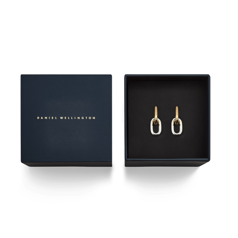 Contrast Link Earrings Two Tone Gold displayed in a Daniel Wellington gift box, featuring polished gold and silver links with a modern, architectural design.