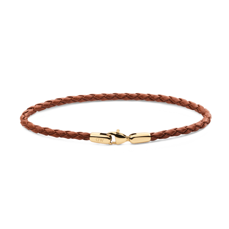 Slim braided brown leather bracelet with a gold-tone stainless steel clasp, featuring a minimalist and refined design suitable for men's everyday or formal wear.