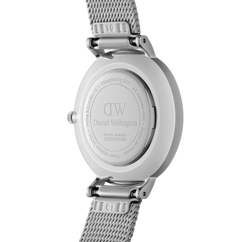 Back view of the Petite Roman Numerals Sterling watch showing the engraved stainless steel case, secure mesh strap, and interchangeable strap mechanism for easy adjustment.