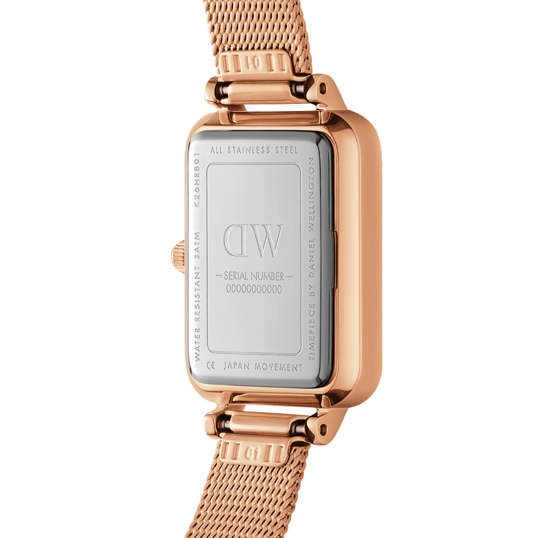 Back view of the Quadro Lumine Bezel Melrose Pink MOP rose gold watch, showing the stainless steel case, engraved details, and mesh strap attachment.