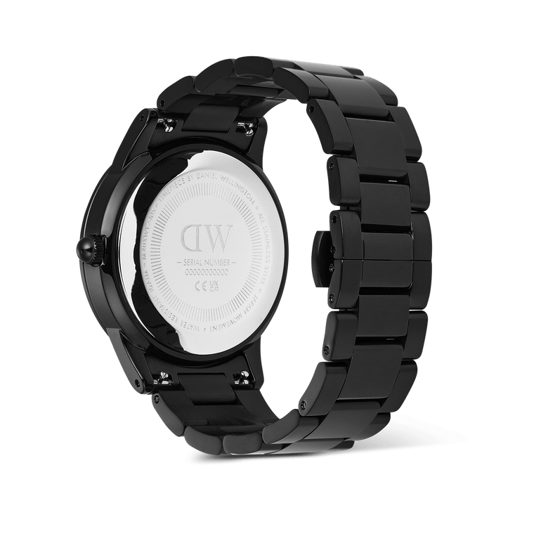 Back view of the Iconic Paradigma Link Black watch showing the engraved stainless steel case back, robust black three-link bracelet, and secure butterfly clasp.