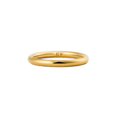 A slim, rounded gold ring with a high-polish finish, featuring a discreet inner logo and a minimalist design suitable for stacking or wearing alone.