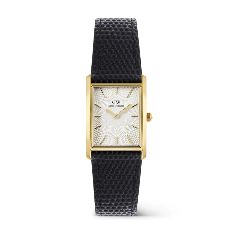 Rectangular men's watch with a gold-toned case, white guilloché dial, and textured black lizard grain leather strap, featuring minimalist gold hour markers and a slim profile suitable for both formal and casual wear.