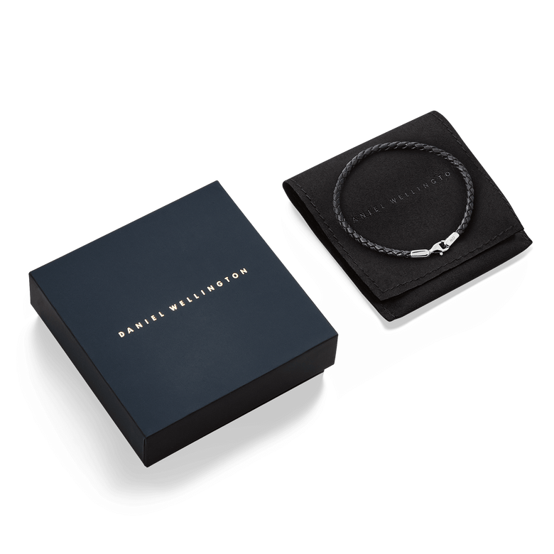 Daniel Braided Leather Bracelet Sheffield 2.8 Silver displayed on a branded pouch next to an elegant Daniel Wellington gift box, highlighting its premium packaging and suitability for gifting.