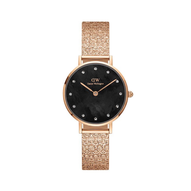 Rose gold ladies watch with a pressed piano link strap, black mother of pearl dial, and crystal markers, designed for everyday wear and elegant styling.