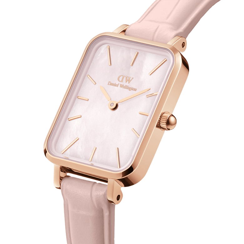 Quadro Pressed Rouge ladies watch with a rectangular rose gold case, pink mother of pearl dial, and nude pink croc-pattern leather strap, shown in a close-up side angle.