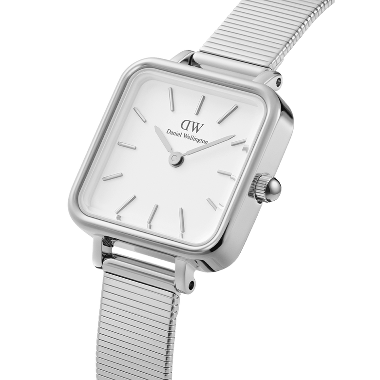 Quadro Studio silver ladies watch featuring a square eggshell white dial, minimalist hour markers, and a polished piano link strap with adjustable clasp, ideal for everyday wear.