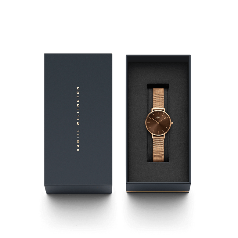 Petite Amber Rose Gold ladies watch with an amber brown dial and rose gold mesh strap, elegantly presented in a branded Daniel Wellington gift box, ideal for gifting or adding to your collection.