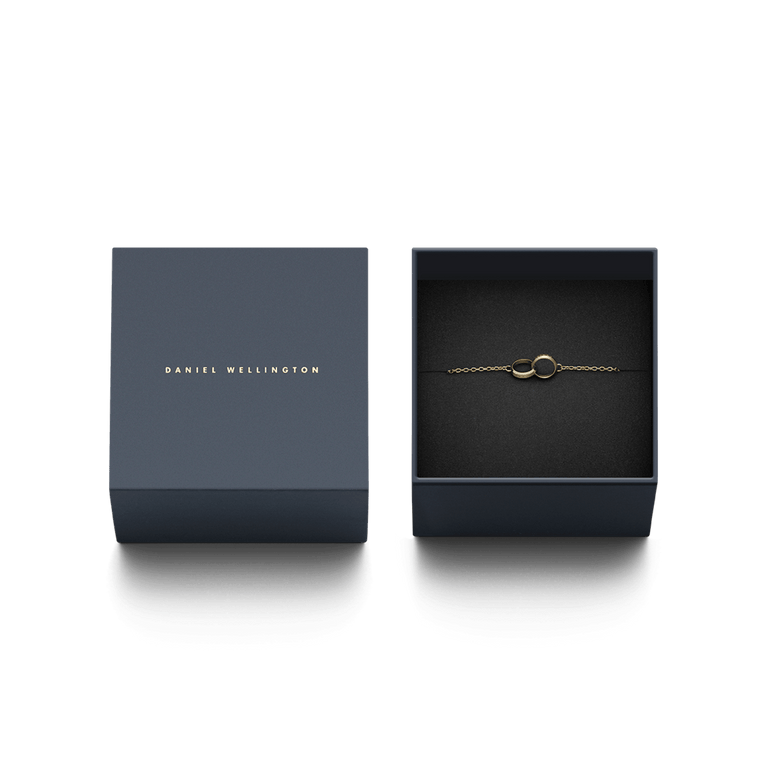 Elan Unity Bracelet presented in a sleek navy gift box, featuring a fine gold chain and interlocking rings for a sophisticated and timeless jewellery gift.