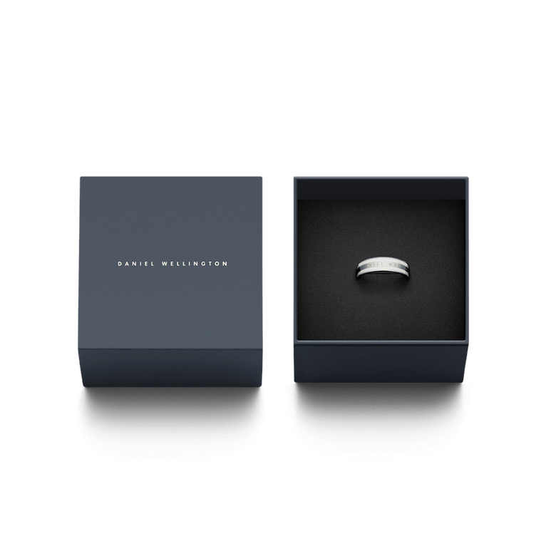 Emalie Ring Silver presented in an elegant Daniel Wellington gift box, featuring a minimalist silver band with a satin white enamel accent and engraved branding, ideal for gifting or special occasions.