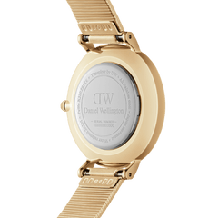 Back view of the Petite Lumine Pressed Piano White MoP Gold watch, showing the engraved stainless steel case and gold pressed Studio Strap with adjustable links.