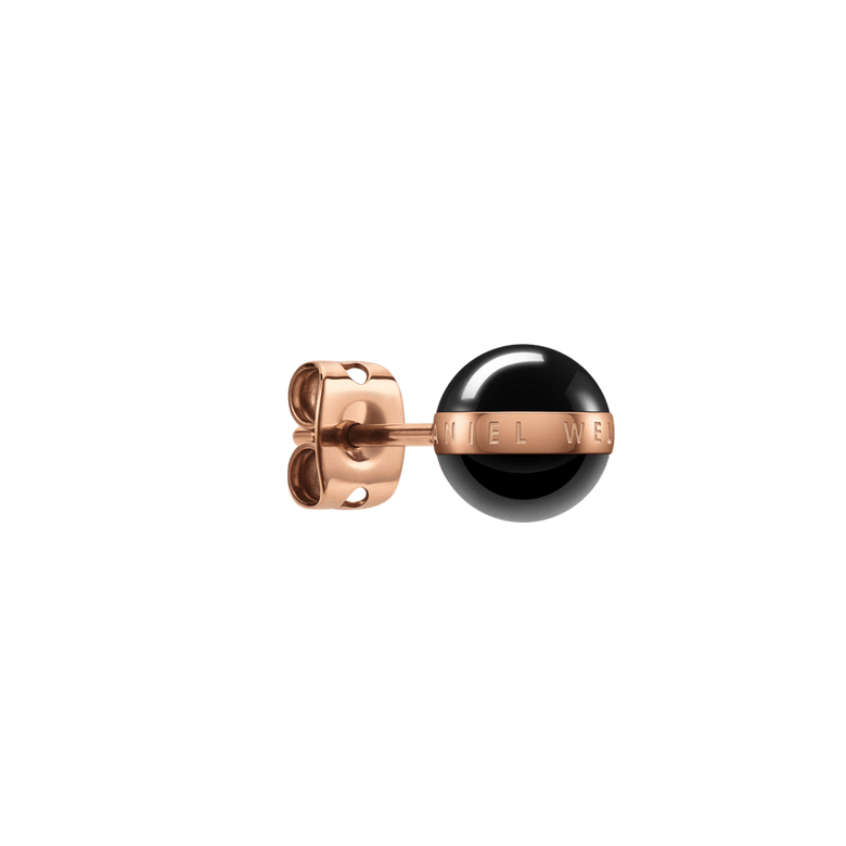 Single Aspiration Earring Rose Gold Black shown from the side, featuring a polished black ceramic sphere with a rose gold plated band and secure butterfly fastening.