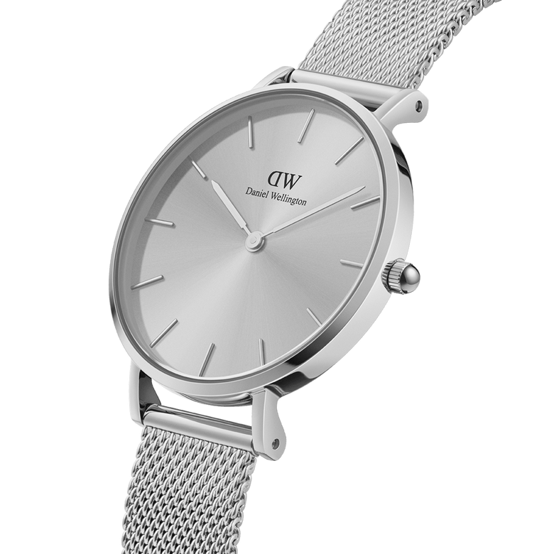 Petite Unitone Silver features a sleek round dial with minimalist silver markers and an adjustable stainless steel mesh strap, designed for a comfortable and elegant fit on petite wrists.