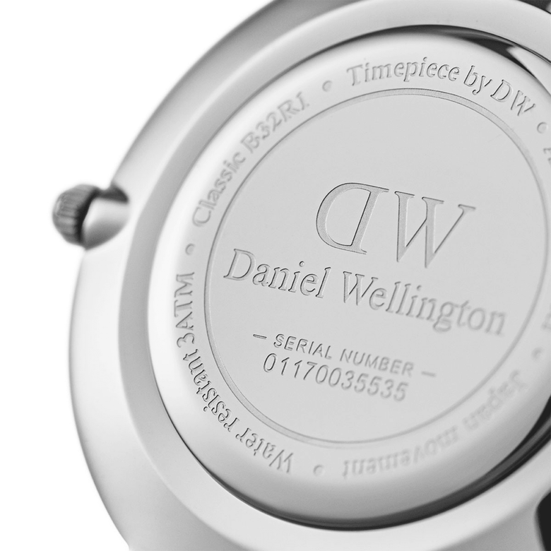 Close-up of the case back of the Petite Bondi Silver watch, showing engraved Daniel Wellington branding, water resistance rating, and unique serial number.