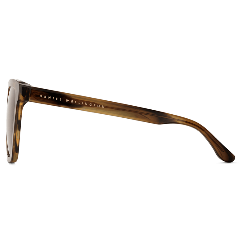Side view of Grande Bio-Acetate Brown Demi sunglasses showing the brown demi patterned temple with Daniel Wellington branding and a smooth, lightweight finish.
