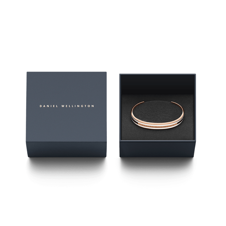 Emalie Slim Bracelet Rose Gold presented in a stylish Daniel Wellington gift box, highlighting its rose gold and white enamel design as a sophisticated jewellery gift option.