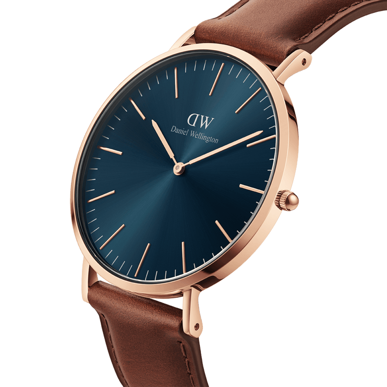 Classic St Mawes Arctic Rose Gold watch with a sleek blue dial, rose gold stainless steel case, minimalist hour markers, and a brown Italian Nappa leather strap.