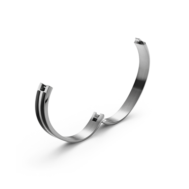 Emalie Infinite Silver Black bracelet shown open, highlighting the concealed closing system and smooth stainless steel interior for comfortable everyday wear.