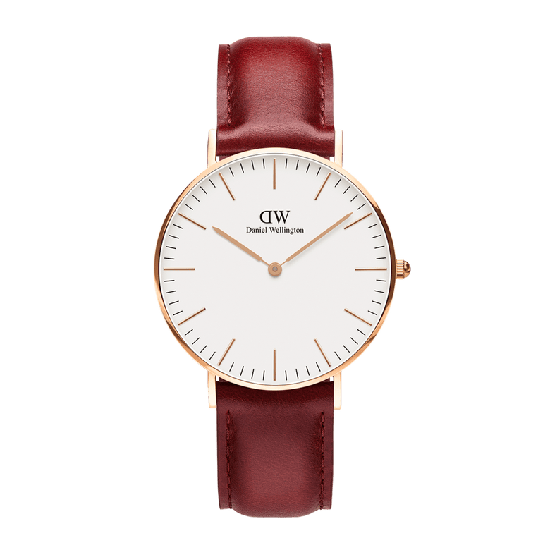 Classic Suffolk Rose Gold watch with a slim rose gold case, minimalist eggshell white dial, and a rustic red genuine leather strap, designed for versatile everyday wear.
