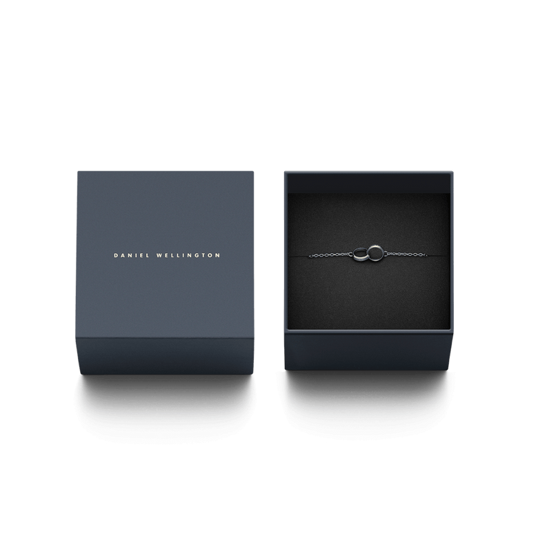 Elan Unity Bracelet Silver presented in a navy Daniel Wellington gift box, featuring two interlocking rings on a delicate silver chain for a classic and elegant jewellery gift.
