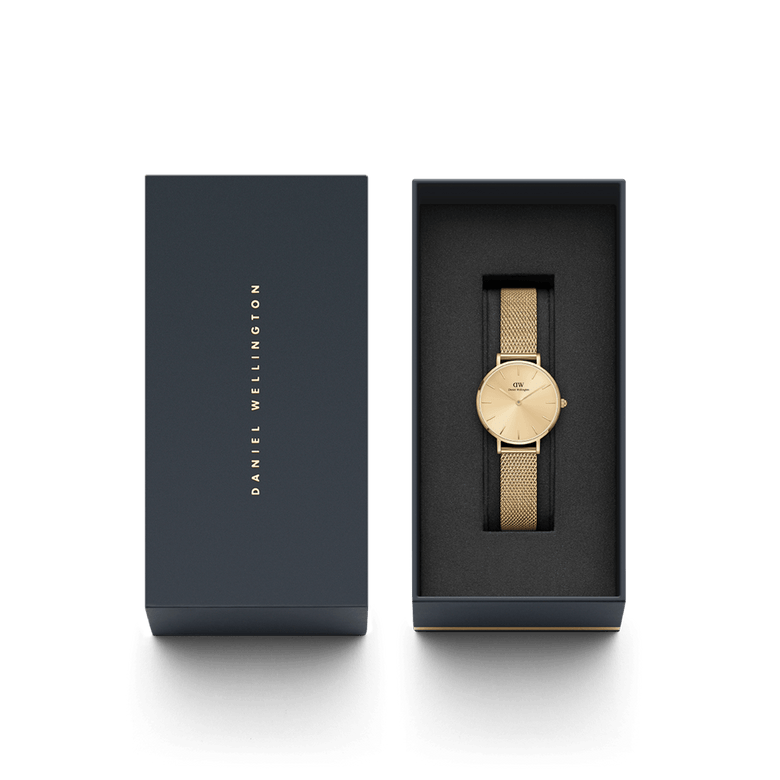 Petite Unitone Gold watch with a gold mesh strap and minimalist dial, presented in a sleek black Daniel Wellington gift box, ideal for gifting or adding to your collection.