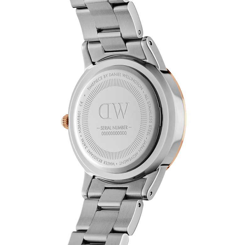 Back view of the Iconic Link Lumine Rose Gold watch, showing the stainless steel case, engraved branding, and secure link bracelet with rose gold accents.