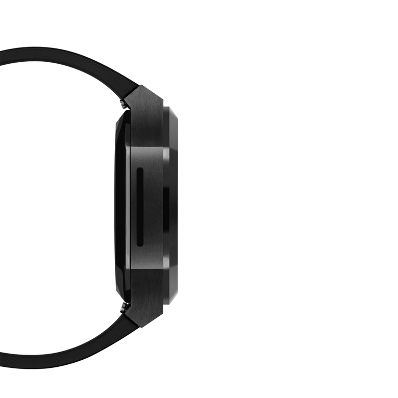 Side profile of the Switch Black Black Apple Watch case, showing the brushed stainless steel frame, geometric contours, and the integrated FKM rubber strap for Series 6, 5, 4, and SE models.