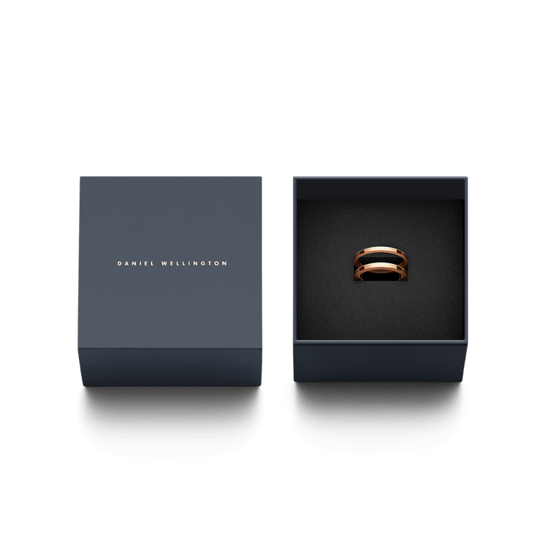 Elan Dual Ring Rose Gold presented in a navy Daniel Wellington gift box, highlighting its double-band design and elegant rose gold finish, ideal for gifting or adding to your jewellery collection.
