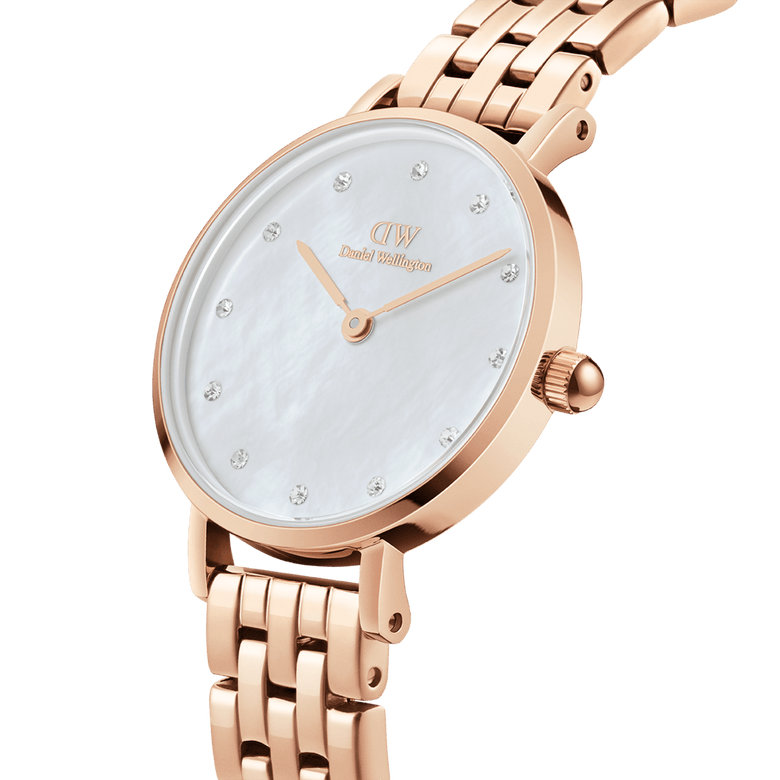 Close-up of the Petite Lumine 5 Link Melrose White MoP Rose Gold watch, showing its rose gold five-link bracelet, white mother of pearl dial, and crystal hour markers for a sophisticated ladies accessory.