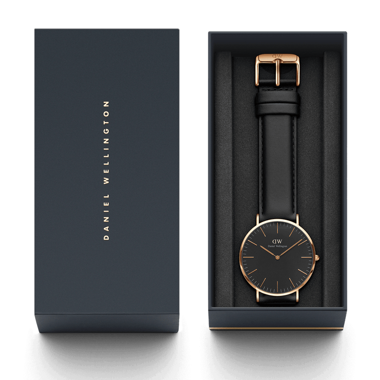 Classic Sheffield Black Rose Gold men’s watch with a black dial and black leather strap, presented in an elegant Daniel Wellington gift box.
