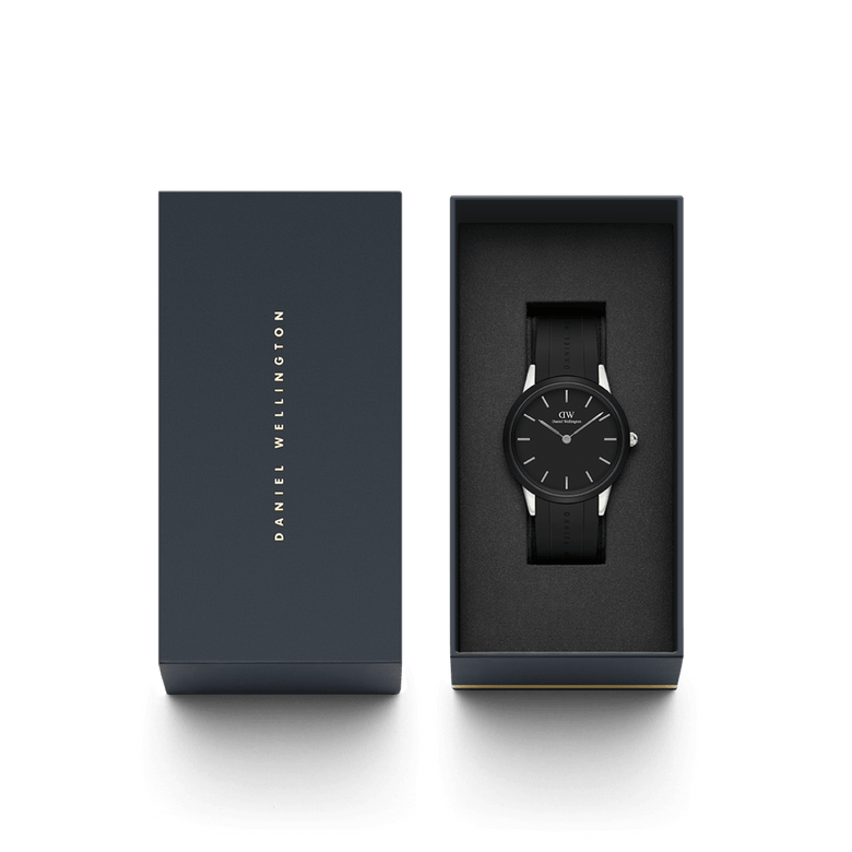 Daniel Wellington Iconic Motion Silver watch with a black dial and black FKM rubber strap, presented in an elegant branded gift box, ideal for gifting or personal use.