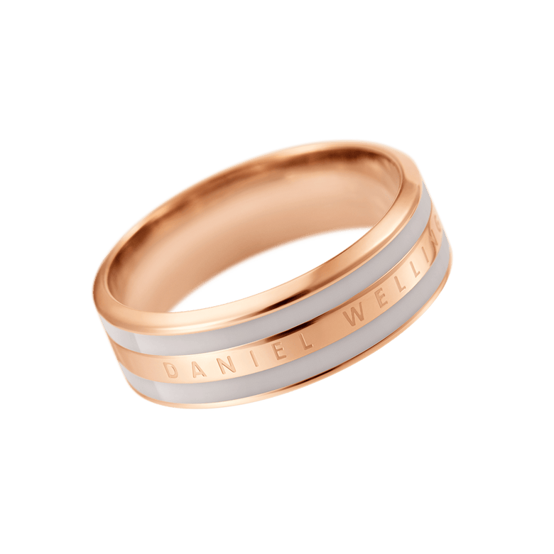 Rose gold ring with a minimalist band design, featuring a soft desert sand enamel inlay and the Daniel Wellington logo engraved along the side.