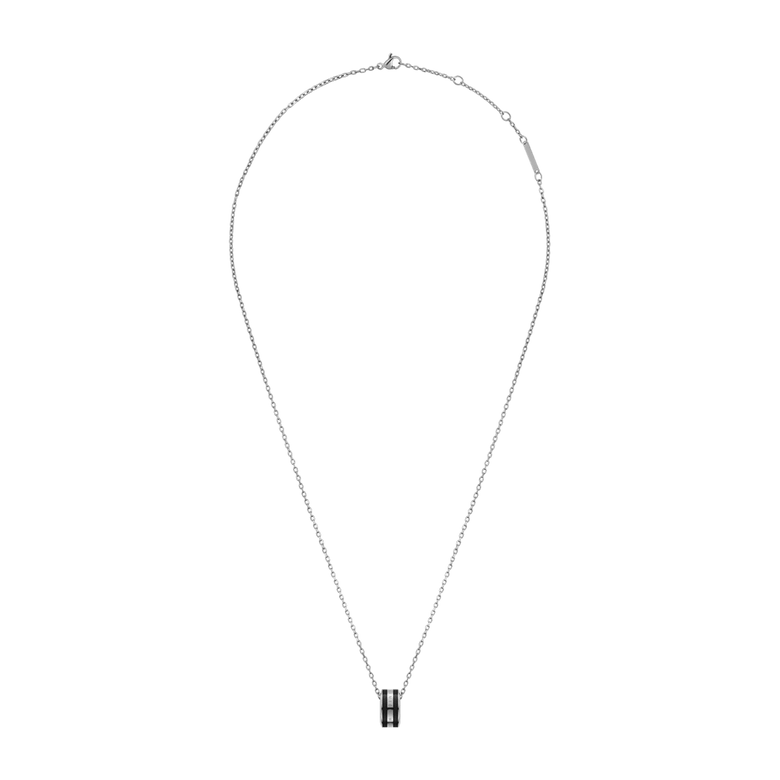 Emalie Necklace Silver Black features a fine adjustable silver chain with a bold black enamel pendant, combining minimalist style with a modern edge for versatile everyday wear.