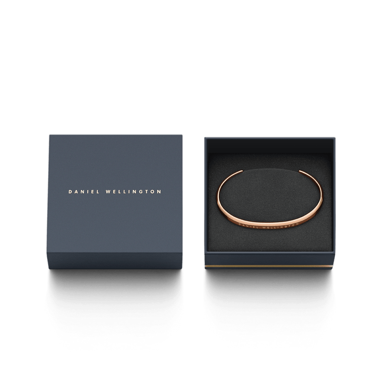 Classic Bracelet Rose Gold by Daniel Wellington presented in a sleek branded gift box, featuring a slim, minimalist rose gold cuff design.