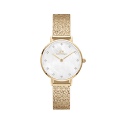 Petite Lumine Pressed Piano White MoP Gold watch with a gold pressed Studio Strap, white mother of pearl dial, and crystal hour markers, featuring a slim 28mm case and elegant styling suitable for everyday wear.