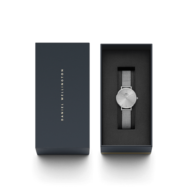 Petite Unitone Silver presented in a sleek branded box, featuring a minimalist silver dial and polished stainless steel mesh strap, ideal as a stylish gift or addition to your collection.