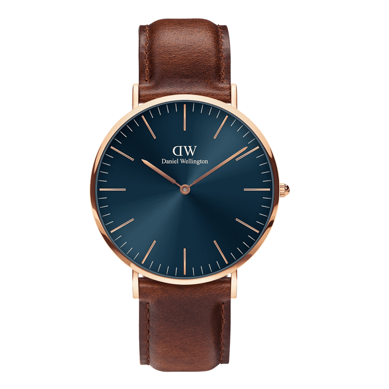 Classic St Mawes Arctic Rose Gold watch featuring a deep blue minimalist dial, rose gold round case, slim line markers, and a brown Italian Nappa leather strap with a polished rose gold buckle.
