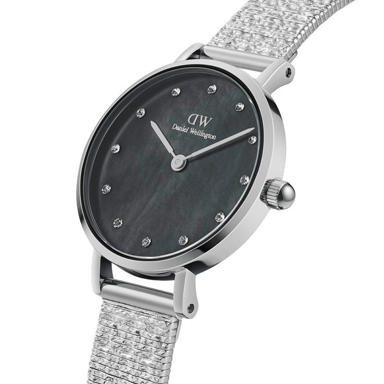 Petite Lumine Pressed Piano Black MoP Silver watch with a 28mm stainless steel mesh-inspired strap, an iridescent black mother of pearl dial, and sparkling crystal hour markers for an elegant, modern finish.