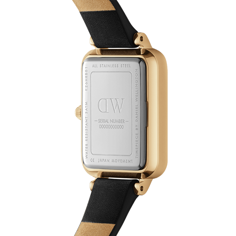 Quadro Pressed Sheffield Gold watch showing the stainless steel case back, gold finish, and black genuine leather strap, highlighting water resistance and Japanese movement details.