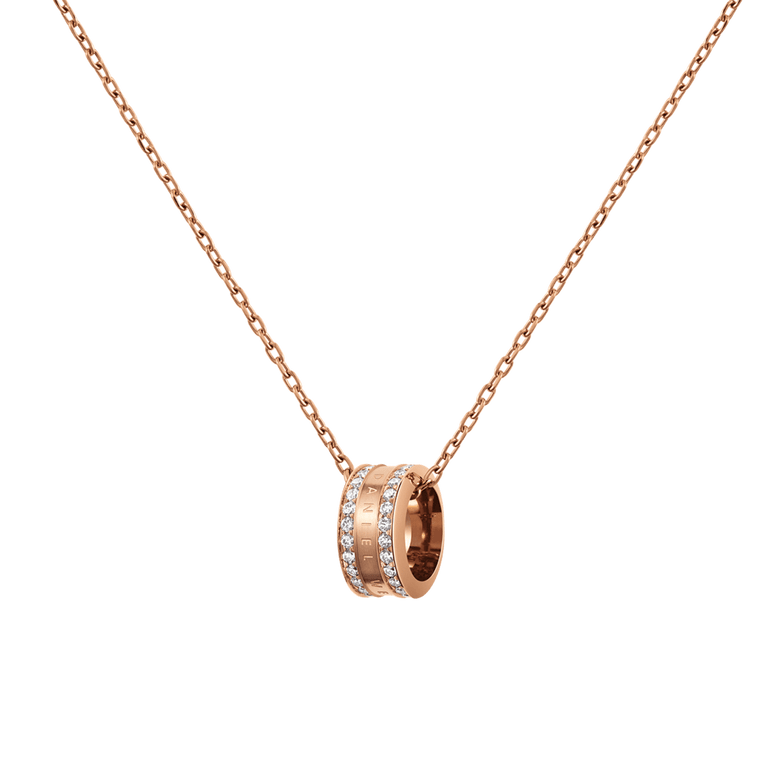 Rose gold necklace featuring a round pendant with crystal accents and engraved detailing, suspended from a delicate adjustable chain.