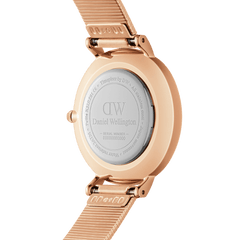 Back view of the Petite Lumine Pressed Piano Black MoP Rose Gold watch showing the engraved stainless steel case and rose gold pressed piano link strap, highlighting the durable construction and adjustable fit.