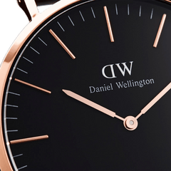 Close-up of the Classic York Black Rose Gold watch face, showing the minimalist black dial with rose gold markers and hands, framed by a rose gold case.