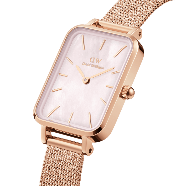 Quadro Pressed Melrose Pink MoP Rose Gold watch with a rectangular rose gold case, pink mother of pearl dial, and a fine rose gold mesh strap, shown in a close-up angle highlighting its elegant finish and minimalist design.