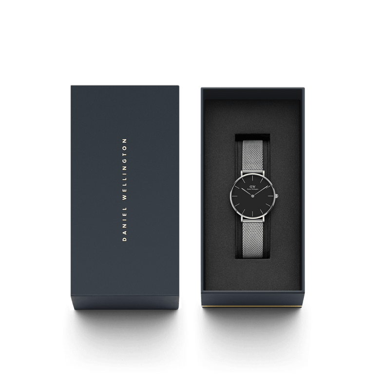 Petite Sterling Black Silver watch presented in a sleek Daniel Wellington gift box, featuring a minimalist black dial and silver mesh strap, ideal for gifting or special occasions.