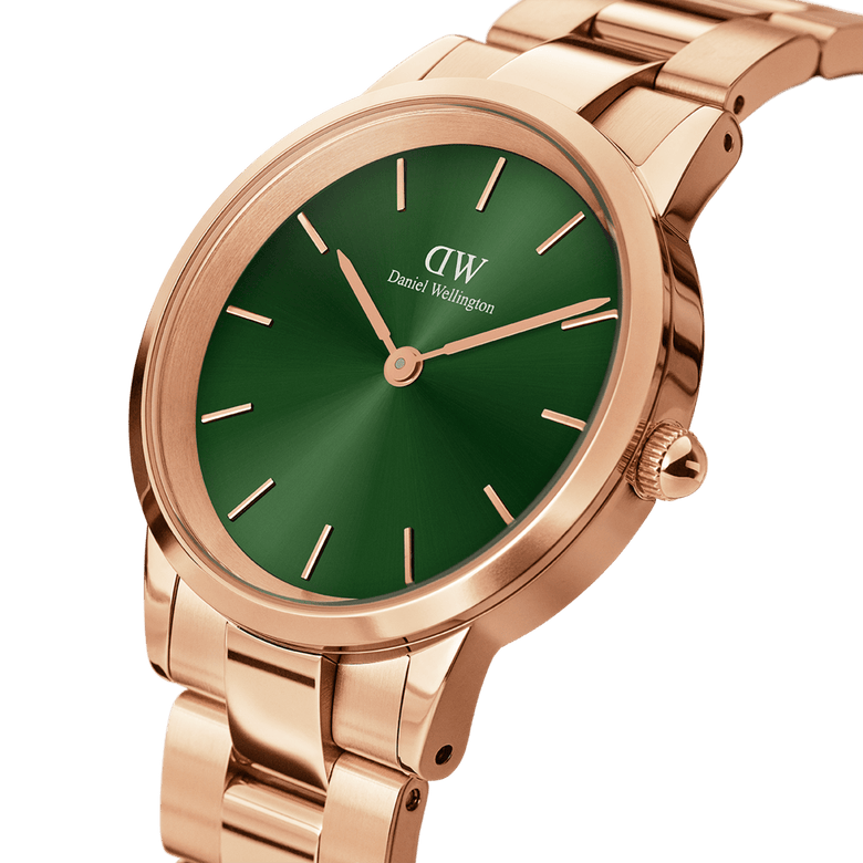 Iconic Link Emerald Green Rose Gold watch with a brushed rose gold stainless steel bracelet and a vivid emerald green dial, shown from a side angle to highlight its elegant minimalist design.