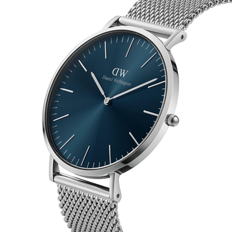 Classic Mesh Arctic Silver watch featuring a blue sunray dial, slim stainless steel case, and bright silver mesh strap, shown at an angle to highlight its minimalist design and modern elegance.